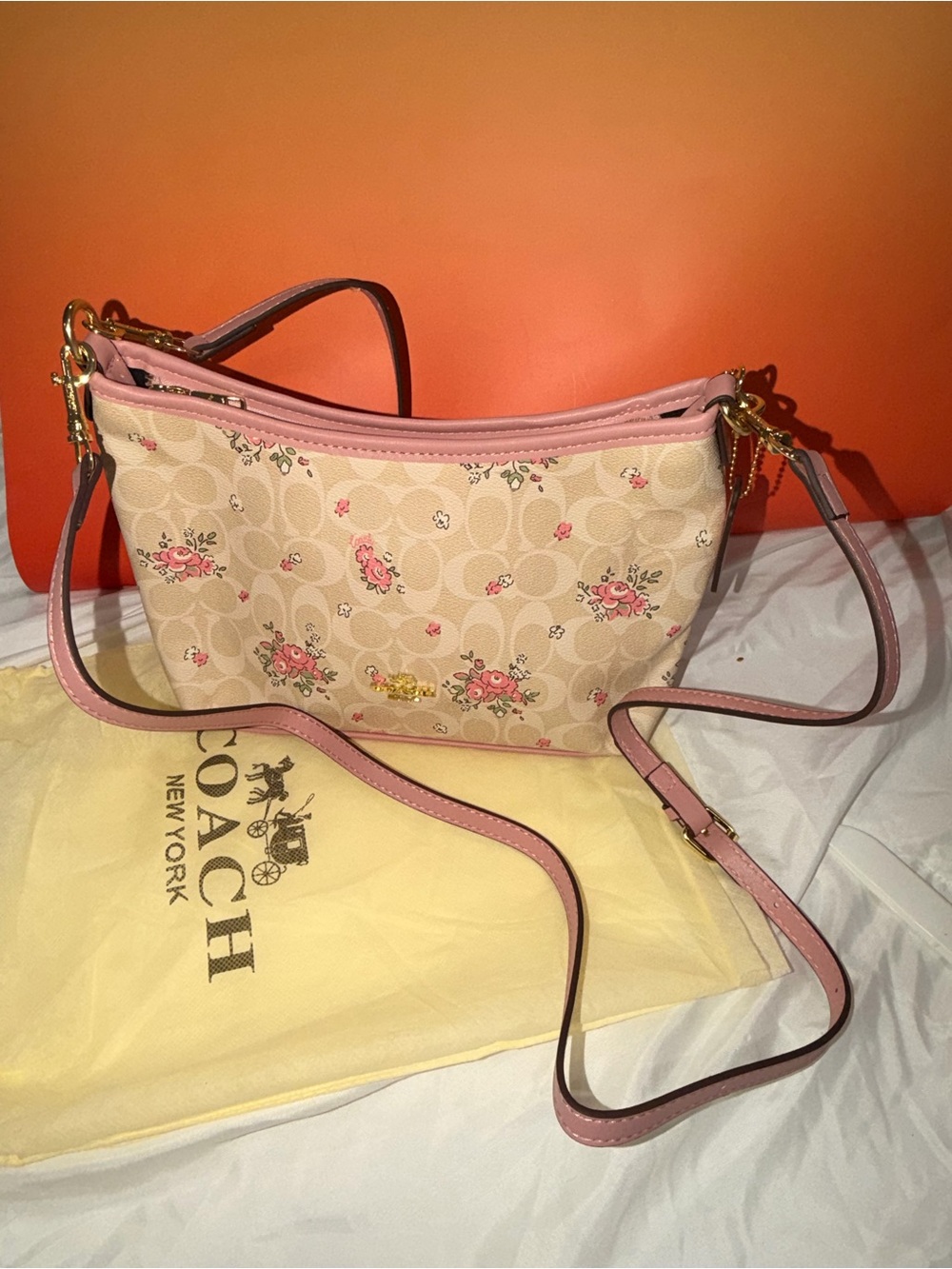 Fashion inspired Beige Signature Floral Crossbody with Pink Trim